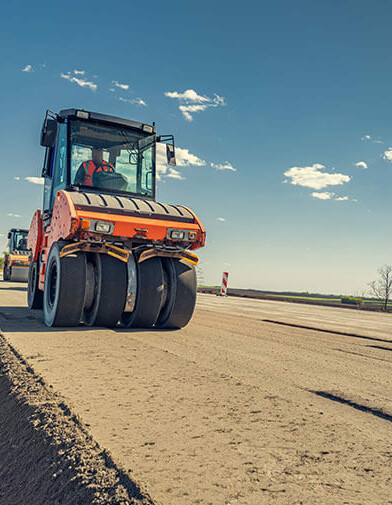 compacting machinery preparing a foundation