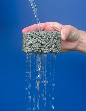 demonstration of water flowing through small piece of pervious concrete