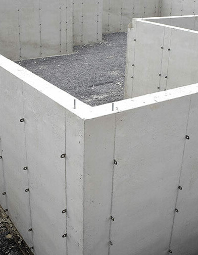 smooth, clean concrete walls prepped for future construction