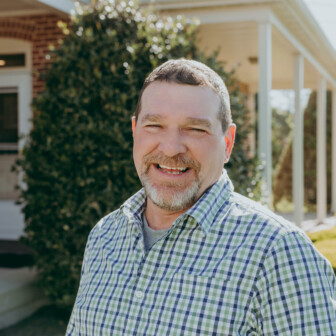 Tim Rohrer smiling at the camera