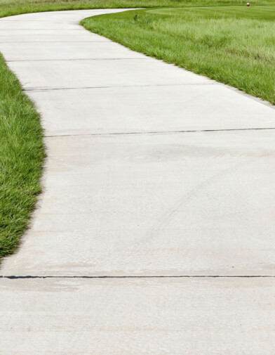 product image of a finished, crisp-lined, winding sidewalk